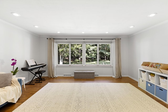 15178 154th Ave, Grand Haven, MI 49417 - sitting room with dark wood-type flooring, ornamental molding, and recessed lighting