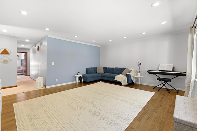15178 154th Ave, Grand Haven, MI 49417 - living area with crown molding, recessed lighting, and wood finished floors