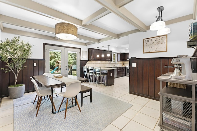 15178 154th Ave, Grand Haven, MI 49417 - dining space featuring beam ceiling, light tile patterned floors, and french doors