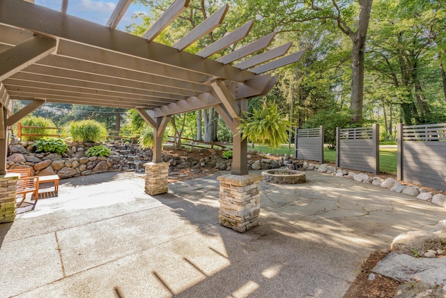 15178 154th Ave, Grand Haven, MI 49417 - view of patio / terrace featuring a fire pit and a pergola