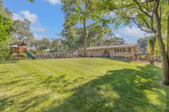 15178 154th Ave, Grand Haven, MI 49417 - view of green lawn with a playground