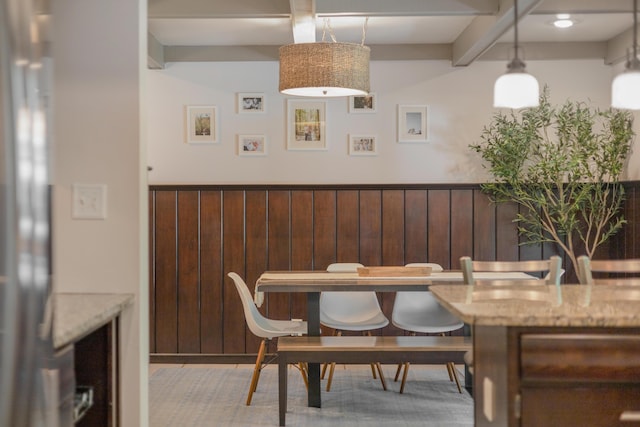 15178 154th Ave, Grand Haven, MI 49417 - dining area featuring beamed ceiling and wooden walls