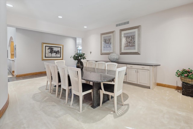 6076 Browns Lake Rd, Jackson, MI 49203 - dining space featuring recessed lighting and arched walkways