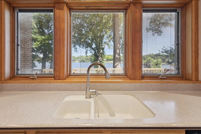 6076 Browns Lake Rd, Jackson, MI 49203 - kitchen view of a sink and light countertops