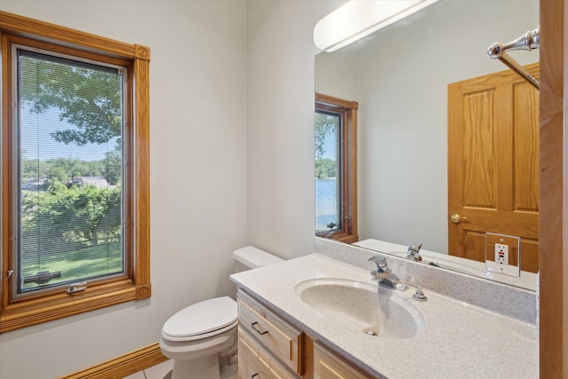 6076 Browns Lake Rd, Jackson, MI 49203 - bathroom with toilet and vanity