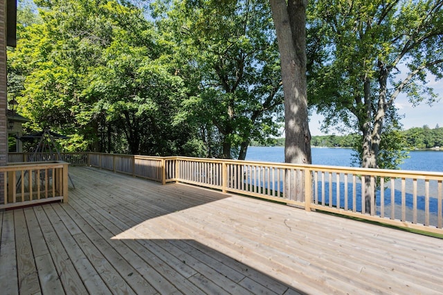 6076 Browns Lake Rd, Jackson, MI 49203 - wooden terrace featuring a water view
