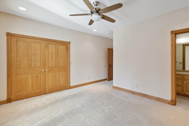 6076 Browns Lake Rd, Jackson, MI 49203 - unfurnished bedroom featuring light carpet, ensuite bath, recessed lighting, and ceiling fan