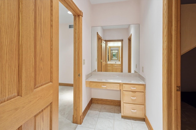 6076 Browns Lake Rd, Jackson, MI 49203 - bathroom featuring baseboards and tile patterned floors