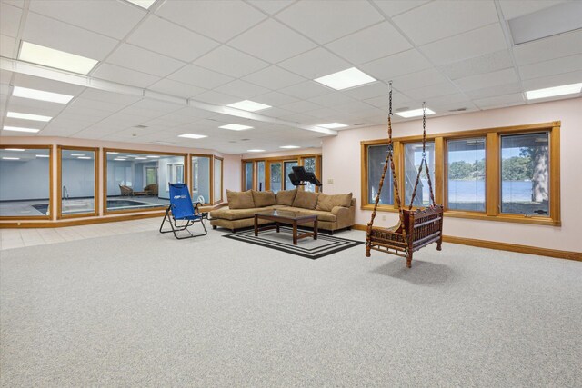 6076 Browns Lake Rd, Jackson, MI 49203 - living room featuring carpet floors and a paneled ceiling