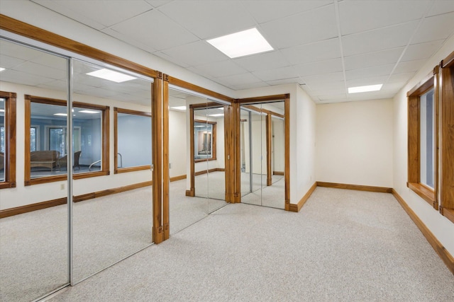 6076 Browns Lake Rd, Jackson, MI 49203 - below grade area with carpet flooring and a paneled ceiling