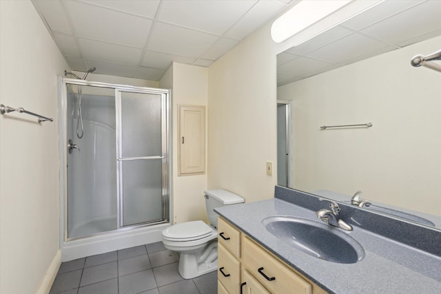 6076 Browns Lake Rd, Jackson, MI 49203 - bathroom featuring tile patterned floors, a shower stall, a paneled ceiling, and vanity