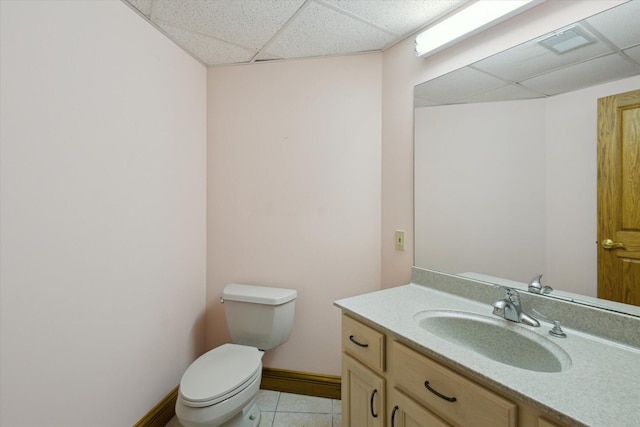 6076 Browns Lake Rd, Jackson, MI 49203 - half bath featuring a drop ceiling, vanity, and tile patterned flooring