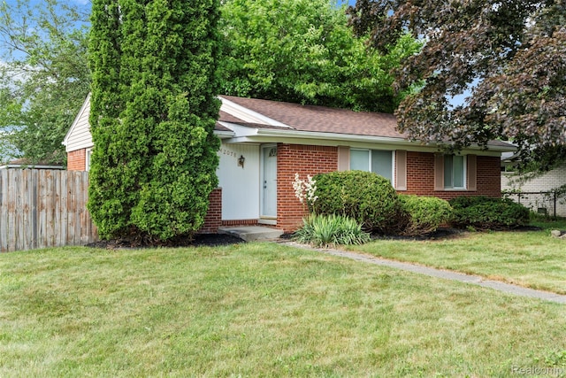 42078 Arthur St, Belleville, MI 48111 - view of front of property featuring brick siding and roof with shingles