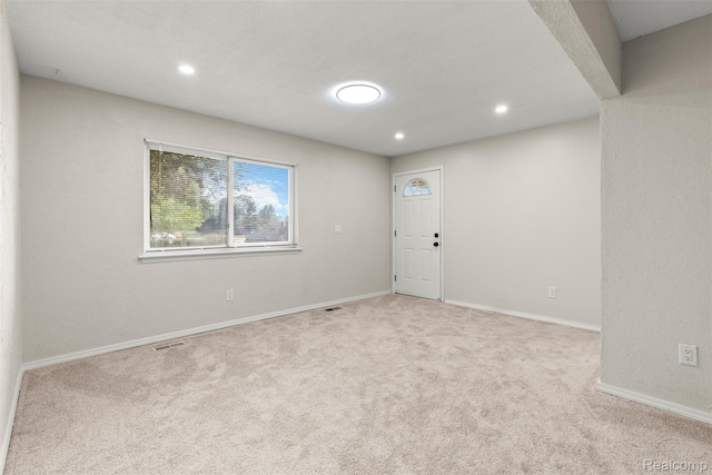 42078 Arthur St, Belleville, MI 48111 - spare room featuring carpet floors and recessed lighting