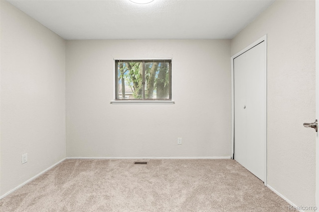 42078 Arthur St, Belleville, MI 48111 - unfurnished bedroom featuring carpet and a closet