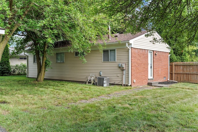 42078 Arthur St, Belleville, MI 48111 - back of house with brick siding