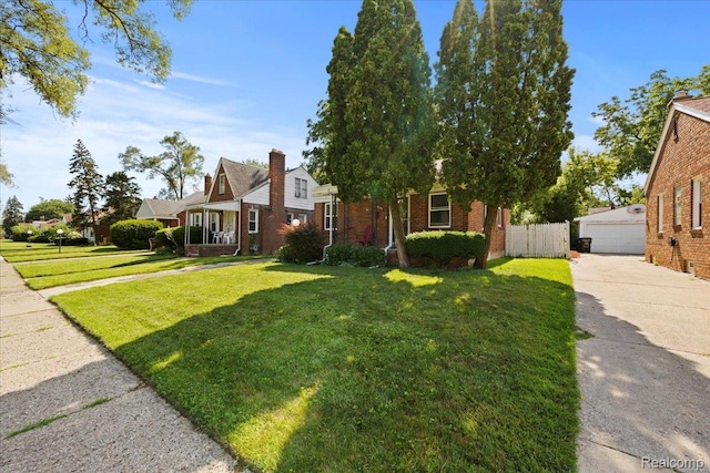 18247 Harlow St, Detroit, MI 48235 - view of front of house with a garage and brick siding