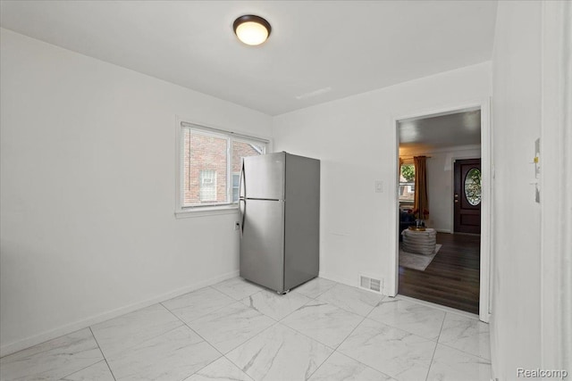 18247 Harlow St, Detroit, MI 48235 - unfurnished room featuring light marble finish flooring and baseboards