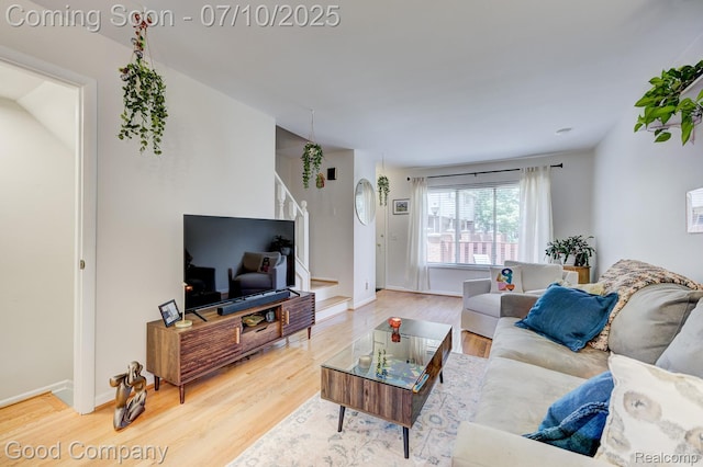 323 W Lincoln Ave, Royal Oak, MI 48067 - living area with wood finished floors and stairs