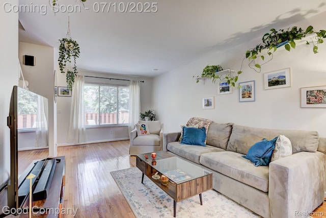 323 W Lincoln Ave, Royal Oak, MI 48067 - living area with hardwood / wood-style floors and baseboards