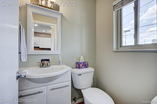 323 W Lincoln Ave, Royal Oak, MI 48067 - bathroom with toilet and vanity