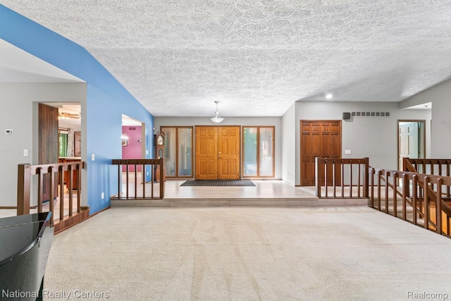 7500 Deerhill Dr, Clarkston, MI 48346 - interior space with an upstairs landing, carpet flooring, and a textured ceiling