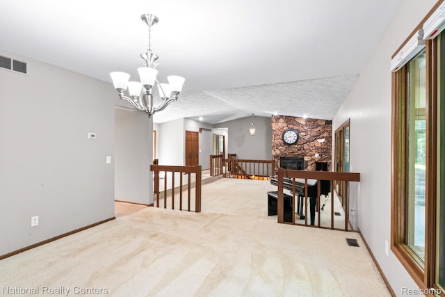 7500 Deerhill Dr, Clarkston, MI 48346 - dining area featuring light carpet, a chandelier, lofted ceiling, and a fireplace