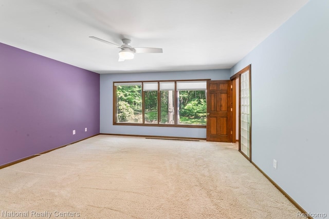 7500 Deerhill Dr, Clarkston, MI 48346 - carpeted empty room with a ceiling fan and baseboards