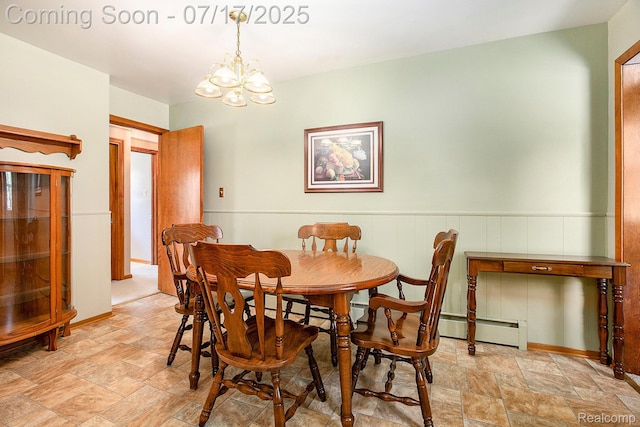 22950 Koths St, Taylor, MI 48180 - dining area with baseboard heating, stone finish flooring, and a chandelier