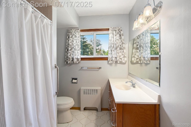 22950 Koths St, Taylor, MI 48180 - bathroom featuring radiator, vanity, tile patterned floors, and curtained shower