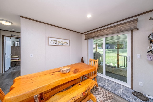 17648 Lost Lake Rd, Barryton, MI 49305 - dining space featuring crown molding and dark wood finished floors