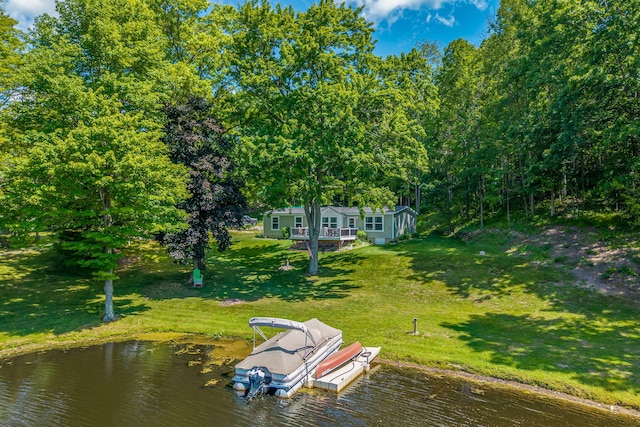 17648 Lost Lake Rd, Barryton, MI 49305 - dock area featuring a yard and a water view