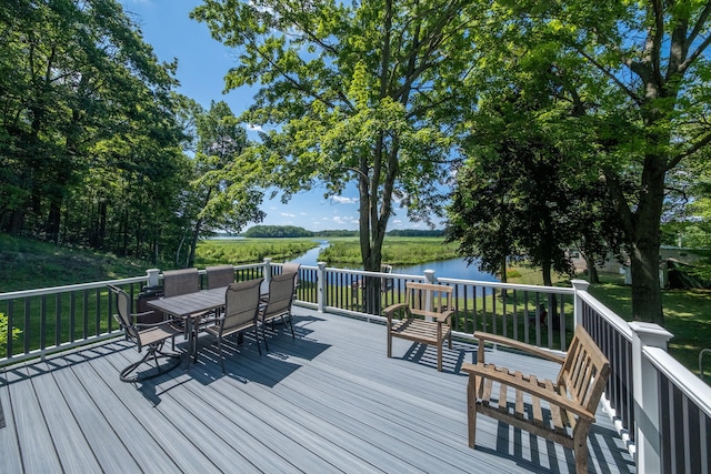 17648 Lost Lake Rd, Barryton, MI 49305 - deck with a water view and outdoor dining area