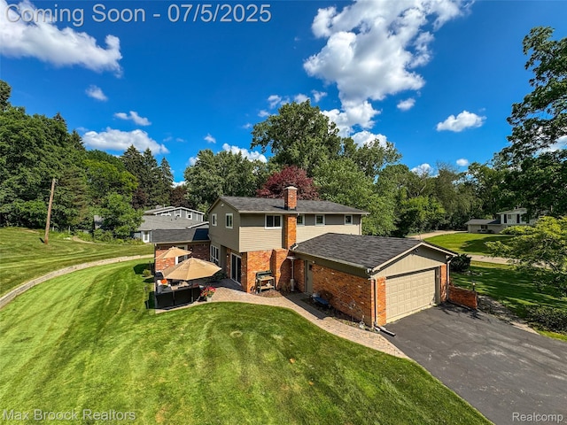 6907 W Knollwood Cir W, Bloomfield, MI 48322 - view of front of house with brick siding, a garage, a front lawn, driveway, and a chimney