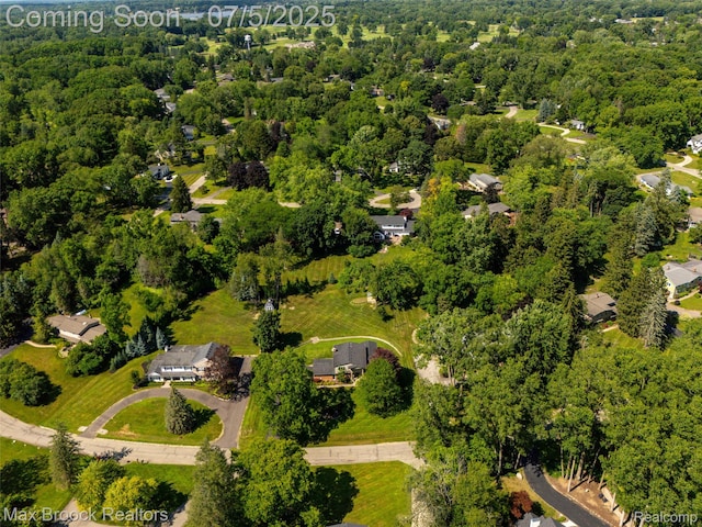 6907 W Knollwood Cir W, Bloomfield, MI 48322 - aerial view of property's location featuring a forest