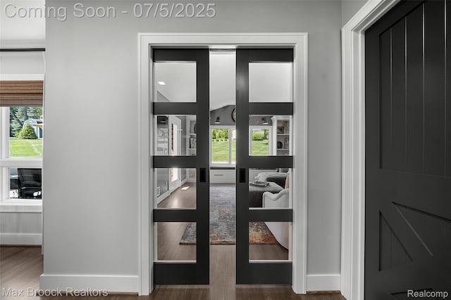 6907 W Knollwood Cir W, Bloomfield, MI 48322 - detailed view of wood finished floors and baseboards
