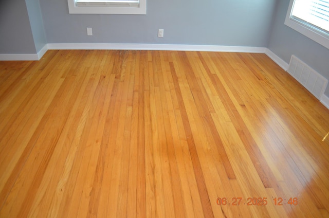 403 Hoover Ave, Benton Harbor, MI 49022 - empty room featuring light wood-style floors and baseboards