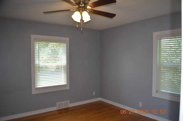 403 Hoover Ave, Benton Harbor, MI 49022 - unfurnished room featuring ceiling fan and wood finished floors