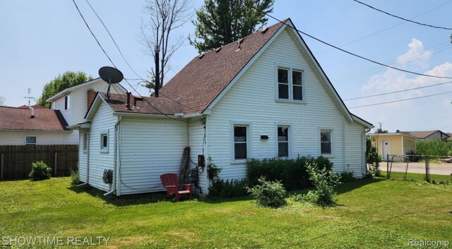 9825 Willow Ct, Clay, MI 48001 - back of property with a shingled roof