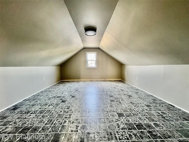 2109 Military St, Port Huron, MI 48060 - additional living space featuring lofted ceiling and a textured ceiling