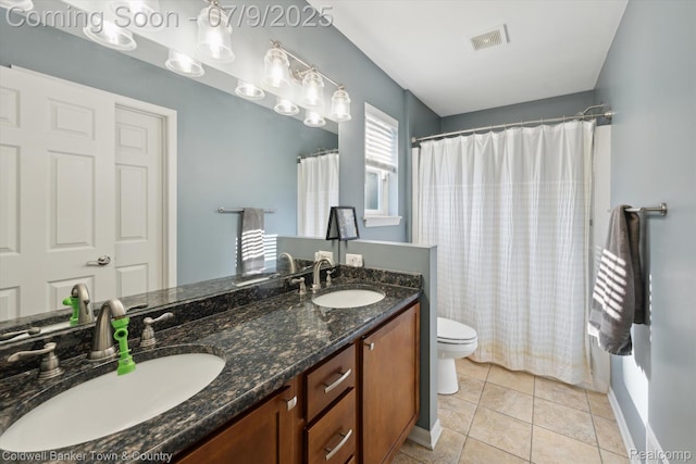 4577 Oaklawn Dr, Pinckney, MI 48169 - bathroom with double vanity, curtained shower, and tile patterned flooring