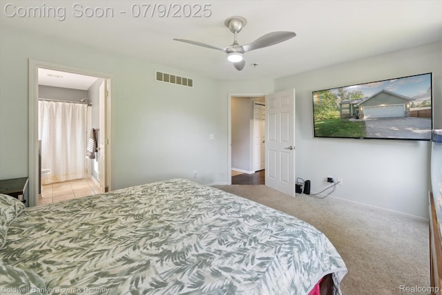 4577 Oaklawn Dr, Pinckney, MI 48169 - bedroom featuring multiple windows, carpet flooring, ceiling fan, and ensuite bathroom