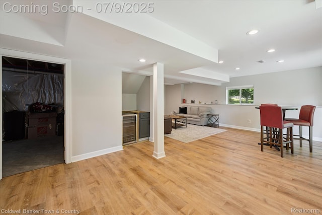 4577 Oaklawn Dr, Pinckney, MI 48169 - living room with beverage cooler, light wood finished floors, and recessed lighting