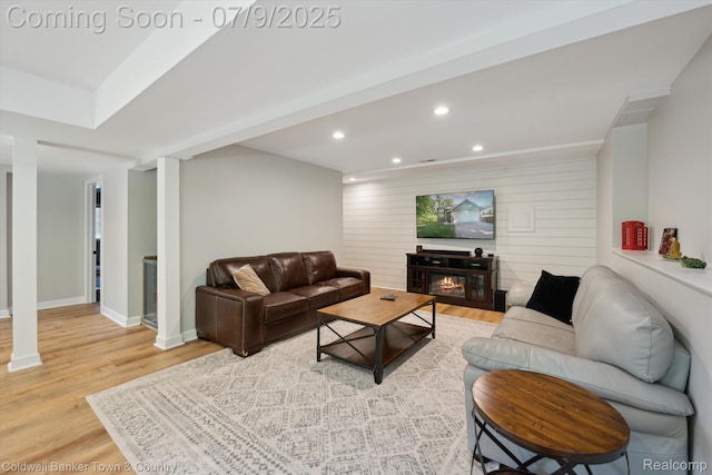 4577 Oaklawn Dr, Pinckney, MI 48169 - living room featuring light wood finished floors, recessed lighting, and a glass covered fireplace