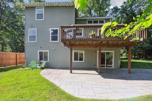 4577 Oaklawn Dr, Pinckney, MI 48169 - back of house featuring a deck and a patio area
