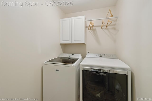4577 Oaklawn Dr, Pinckney, MI 48169 - washroom with cabinet space and washer and clothes dryer