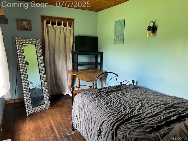 3500 Schlaud Rd, North Branch, MI 48461 - bedroom with dark wood-style flooring and wooden ceiling