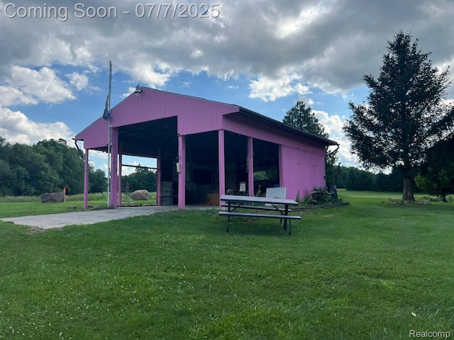 3500 Schlaud Rd, North Branch, MI 48461 - surrounding community featuring a lawn, an outdoor structure, an attached carport, and an outbuilding