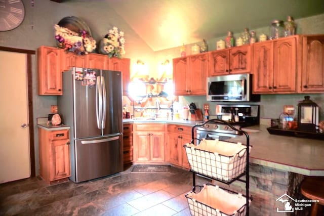 5985 Shady Ln, Newport, MI 48166 - kitchen with stainless steel appliances, lofted ceiling, and light countertops
