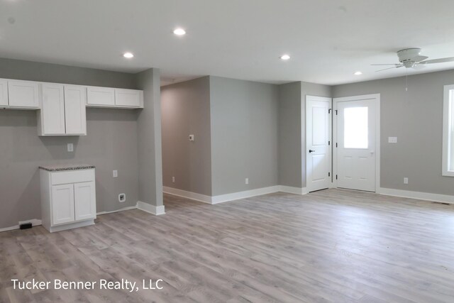 518 S Sullivan Ave, Fremont, MI 49412 - unfurnished living room with a ceiling fan, light wood-style floors, and recessed lighting
